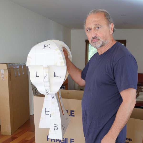 Yuroz with paper model of Eternity sculpture